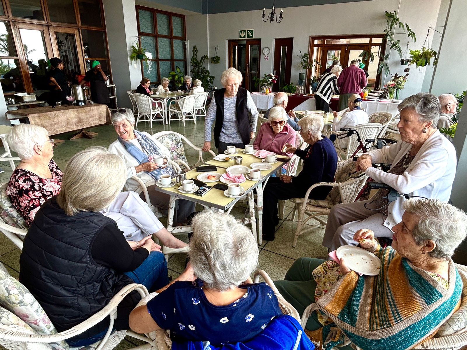 Residents enjoying spacious verandah at Edenroc Retirement Home in Durban